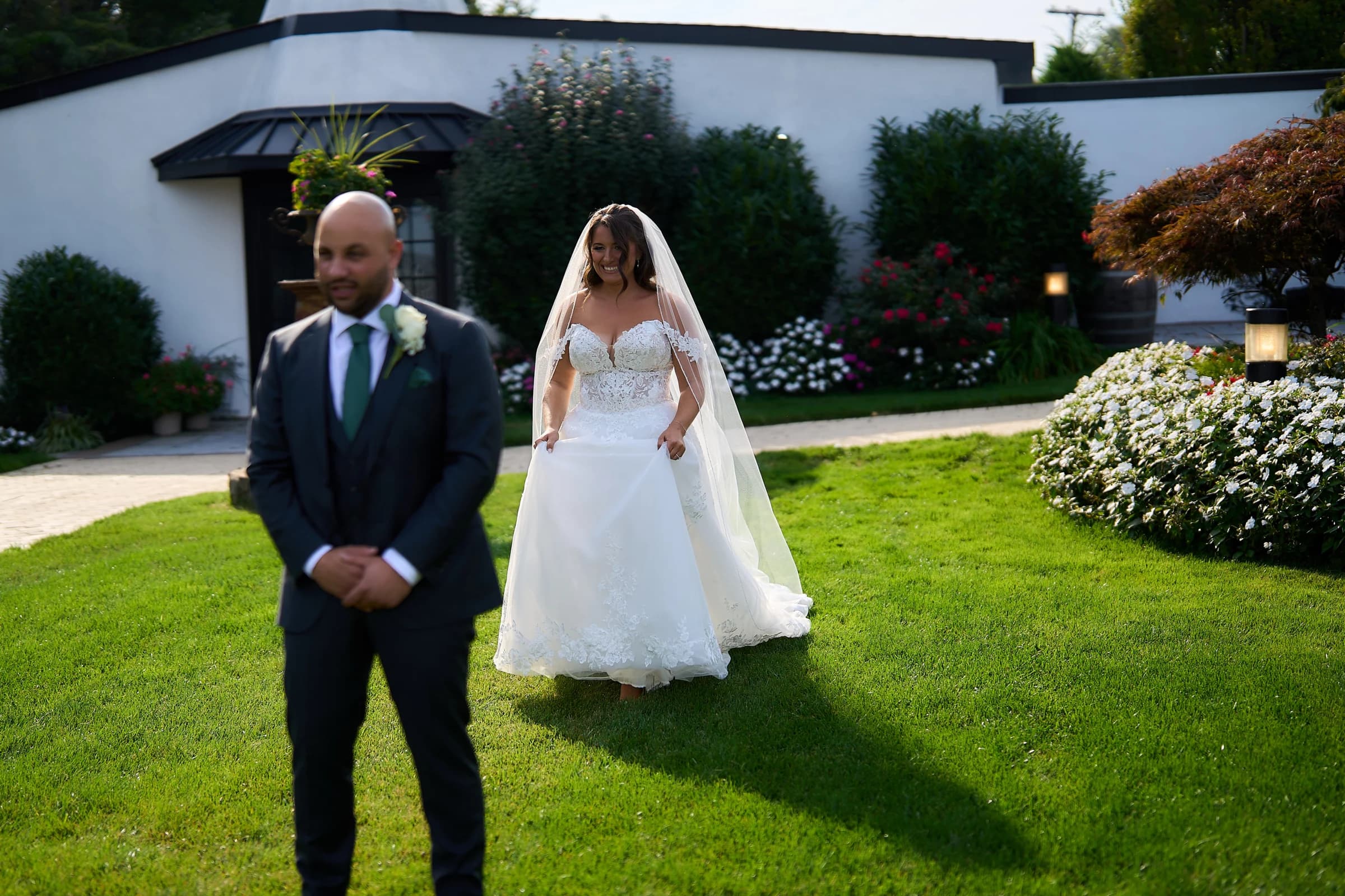 Chateau Briand, Carle Place, Amanda walking across the lawn toward Gabriele for their first look at the Riviera