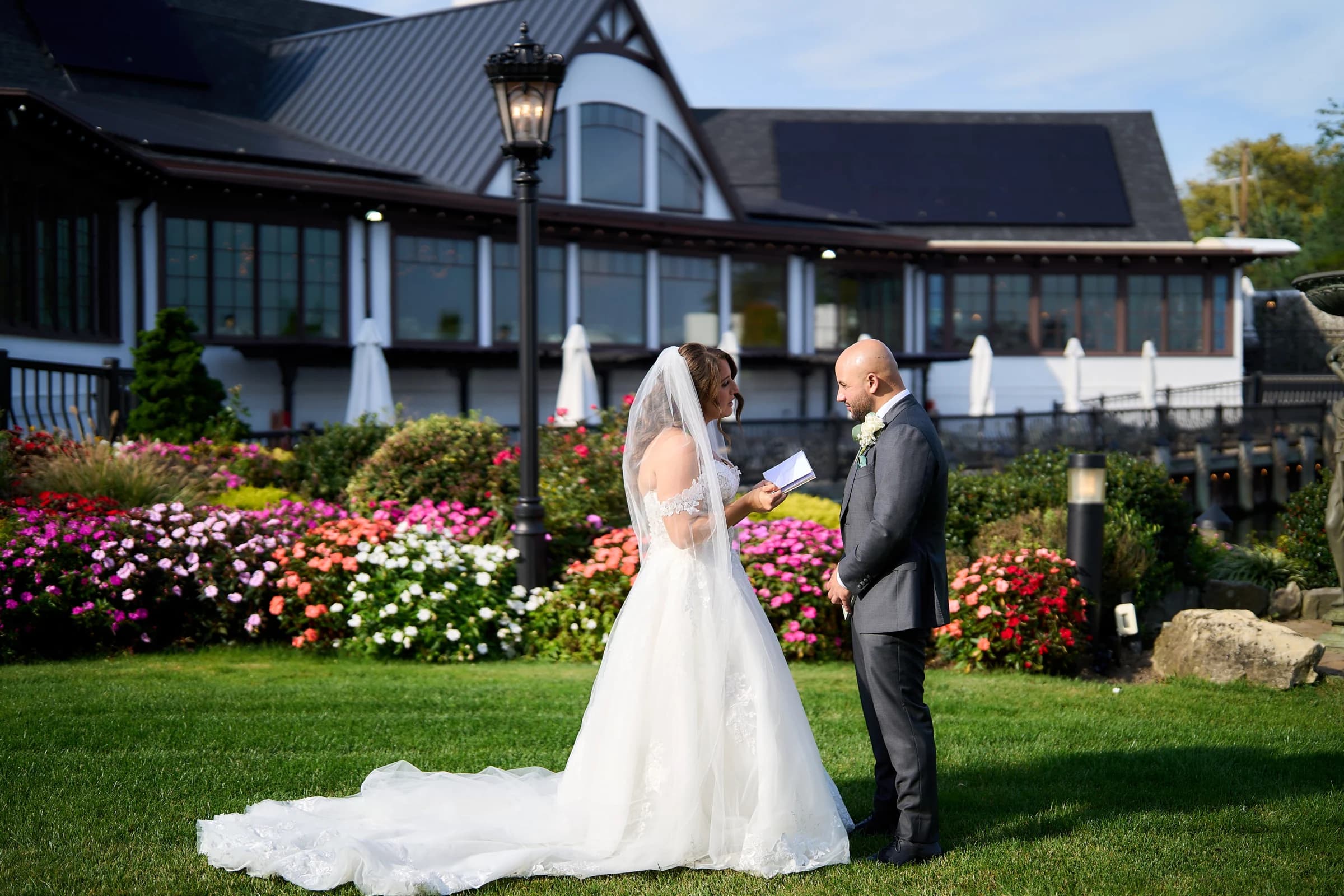 Brecknock Hall, Greenport, Amanda reading private vows to Gabriele on the lawn at the Riviera Waterfront Mansion