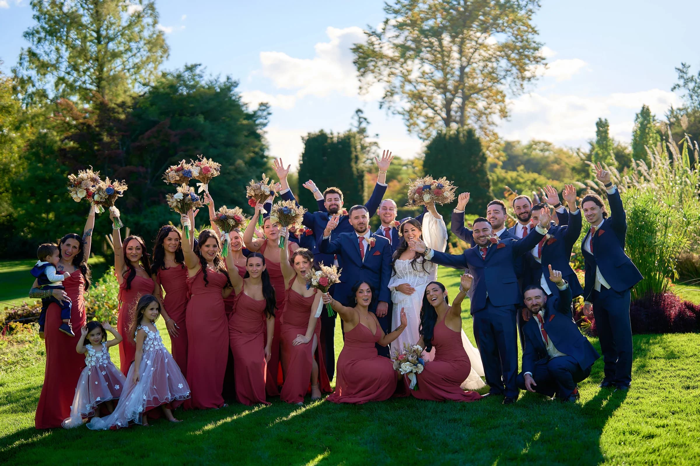 Villa Lombardi's, Holbrook, The wedding party celebrating on the lawn with Stephanie and Peter at the Riviera