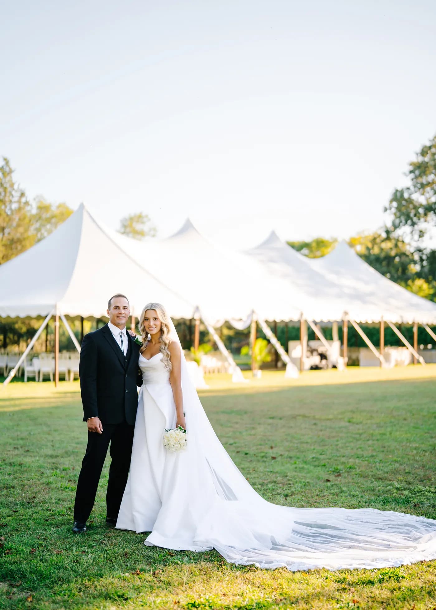 Topping Rose House, Bridgehampton, Outdoor tented reception set on a Long Island venue lawn